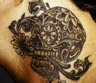 Lucas Silveira's candy skull tattoo, by Kat Von D